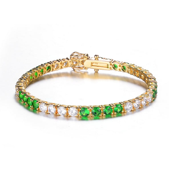 7 inches long tennis bracelet with Round cut Diamond Essence and Emerald Essence stones, 0.20 carat each set in alternate group of 4 stones. 10.4 cts.t.w. in Platinum Plated Sterling Silver.