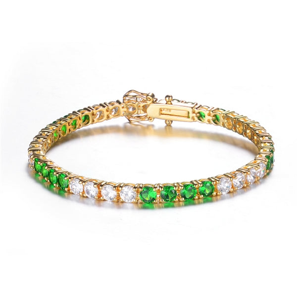 7 inches long tennis bracelet with Round cut Diamond Essence and Emerald Essence stones, 0.20 carat each set in alternate group of 4 stones. 10.4 cts.t.w. in Platinum Plated Sterling Silver.