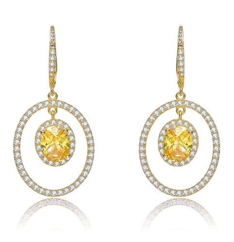 Designer Leverback Earring, with 1.5 carat oval Yellow Citrine Essence surrounded by Round Essence melee, Outlined with bigger oval setting with melee. 5.5 cts.t.w. in Gold Plated Sterling Silver.