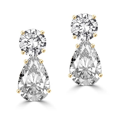 Best Selling Tear Drop Diamond Essence Earrings - White Brilliant Round Stone is 2 Ct and White Brilliant Pear Stone is 5 Ct. A Brilliant Sparkle of 14 Cts. T.W. for the pair of earrings! In 14k Gold Vermeil.