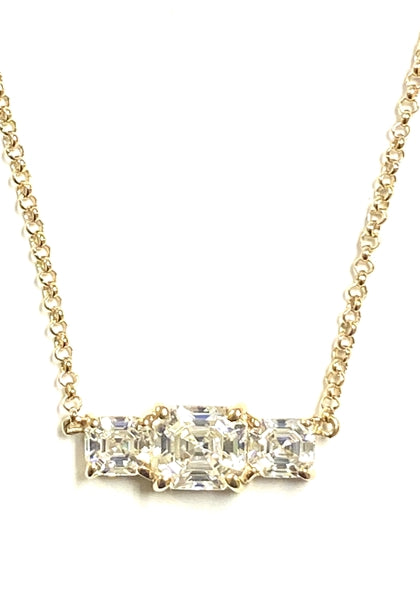 Beautiful Trio Necklace with Diamond Essence Asscher cut Stones set in four prongs, Gold Plated Sterling Silver, 3.5 cts.t.w. 2 carat in the center and 0.75 ct. on each side