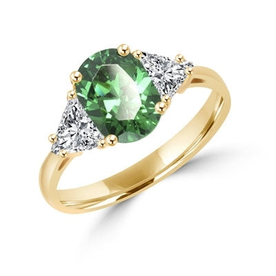 Stunning Ring, 2 Cts. T.W, with 1 Ct Oval Cut Emerald Center and White Trilliant Diamond Essence Stones on side, in Gold Vermeil.