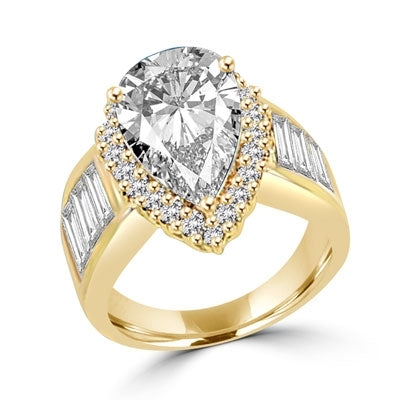 Mesmerizing ring with 4.0 cts. pear cut center, accents and baguettes set in Gold Vermeil.