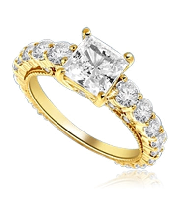 Engagement Ring With Princess Cut Diamond Essence Set in Center accompanied by Round Brilliant Diamond Essence going down the band. 3.25 Cts. T.W. set in 14K Gold Vermeil.