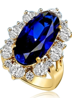 Sapphire Ring - 13 Cts. Long Oval cut Sapphire Essence set in center surrounded by Oval Diamond Essence and Melee. 16.0 Cts. T.W. set in 14K Gold Vermeil.