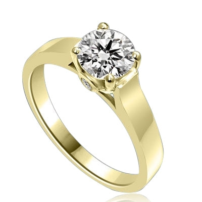 Diamond Essence Solitaire Ring Artistically set in wide band with a beautiful accent on both sides to enhance the looks set in 14K Gold Vermeil.
