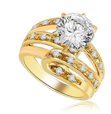 Abstract Art - 2.75 Cts. Round Brilliant Diamond Essence set high in center with Melee set abstract design flowing underneath center to halfway down the band.3.25 Cts. T.W. set in 14K Gold Vermeil.