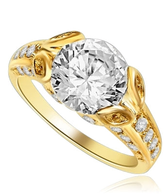 Designer Ring with 3.0 Cts. Round Brilliant Diamond Essence, artistically set in leaf shaped prongs in center, set off by Melee on either side of the band. 4.0 Cts. T.W. set in 14K Gold Vermeil.