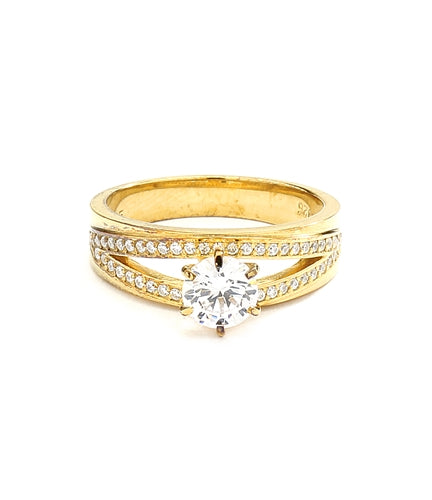 Diamond Essence Ring with 1.0ct. Round brilliant stone set in six prongs with two rows of round stones on each side, 1.20ct. T.W. set in 14K Gold Vermeil.