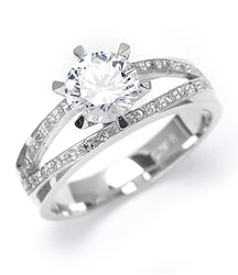 Diamond Essence Ring with 1.0ct. Round brilliant stone set in six prongs with two rows of round stones on each side, 1.20ct. T.W. set in 14K Gold Vermeil.