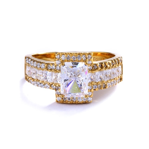 Engagement Ring - 1.75 Cts. Radiant Emerald cut Diamond Essence set in center surrounded by Round Melee and Princess cut Diamond Essence, which flows on band also, making three shinning rows on either side. 5.0 Cts. T. W.