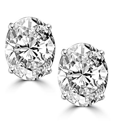 Solid white gold stud earing with oval cut stone