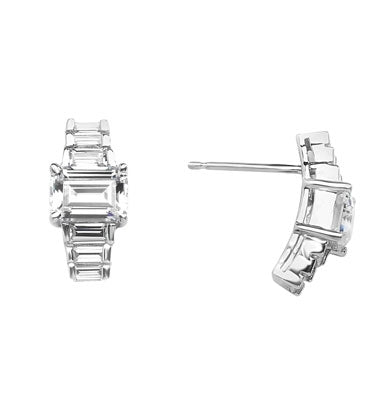 Glowing baguettes form this unique design earrings. 3 Cts T.W. set in 14K Solid White Gold.