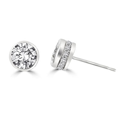 Traditional studs with a twist on the bezel set that shows small accents sideways too! Confess it...you always wanted this! 2.20 Cts. T.W. in 14k Solid White Gold.
