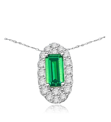 Emerald City Pendant with a 3.0 Cts. Emerald Cut Emerald Essence center surrounded by fiery Round Cut Diamond Essence Stones, 3.30 Cts. T.W. in 14K Solid White Gold.
Free Silver Chain Included.