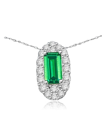 Emerald City Pendant with a 3.0 Cts. Emerald Cut Emerald Essence center surrounded by fiery Round Cut Diamond Essence Stones, 3.30 Cts. T.W. in 14K Solid White Gold.
Free Silver Chain Included.