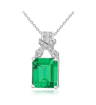 7-carat emerald-cut emerald pendant in Whilte Gold