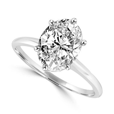 Ring with oval-cut stone set in 14k white gold