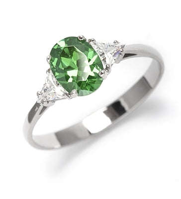 Stunning Ring, 2 Cts. T.W, with 1 Ct Oval Cut Emerald Center and White Trilliant Diamond Essence Stones on side, in 14K Solid White Gold.
