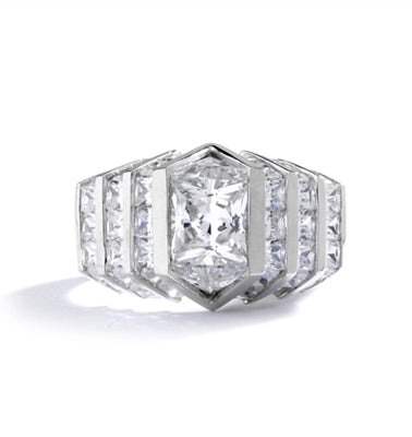 14K Solid White Gold ring with 2.0 cts. center Octrillion stone flanked by beautiful jewels. Stones are cut to fit precisely together with no spaces between them for a stunning solid diamond look