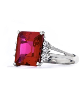 Superb Ring with 5 Cts Emerald Cut Ruby Essence Center Stone and melee accents for a total of 5.2 Cts.t.w. in 14K Solid White Gold.