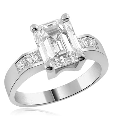 round emerald center stone white gold ring