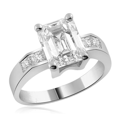 round emerald center stone white gold ring