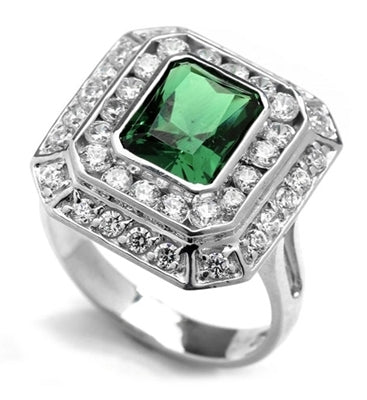 Diamond Essence Cocktail Ring With 2.50 Cts. Emerald Essence Radiant Emerald In Center Round Melee Around It, 4.50 Cts.T.W. In 14K White Gold.