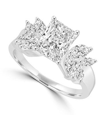 Apassionata - Unusualluy stylish Ring with 1.5 Cts. Radiant Emerald Diamond Essence center and Marquise accents, 3 Cts. T.W, in 14K White Gold.