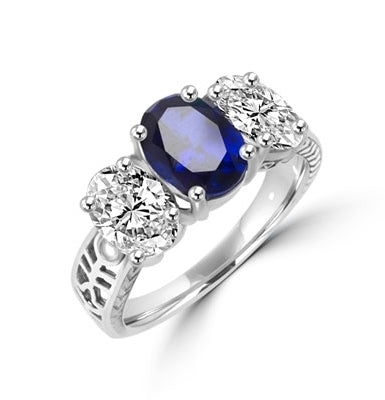 Ovalinas - Three Stone Oval Ring with 2 Ct. Oval Masterpiece on an Ethnic Band and 1.5 Ct.Oval Essence on each side, 5 ct t.w. in 14K White Gold. Center Stone changeable to Many Options.