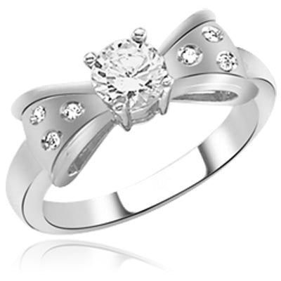 bow tie with round brilliant ring in white gold