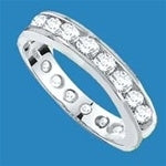 Eternity Band--Flawless round-brilliant Diamond Essence masterpieces completely encircle this channel set wedding band. 2.0 Cts T.W. set in 14K Solid White Gold.