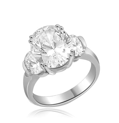 oval cut stone in center & side in white gold ring