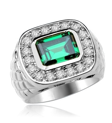 Imposing 14K Solid Whit Gold, Man's ring with a 4.0 ct. bezel-set Emerald cut Emerald center stone attended by a melee of Round cut mini masterpieces. 4.5 cts. t.w. For prime movers.