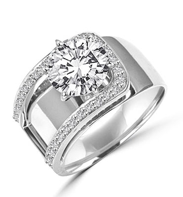 Beauty to Behold. A unique design with 2 Ct. Center and ascending band with round melees. 2.5 Cts. T.W. In 14k Solid Yellow Gold.