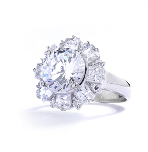 Diamond Essence Designer Ring With Round Brilliant Diamond Essence in center surrounded by alternately set Princess and melee. 7.25 Cts. T.W. set in 14K Solid White Gold.