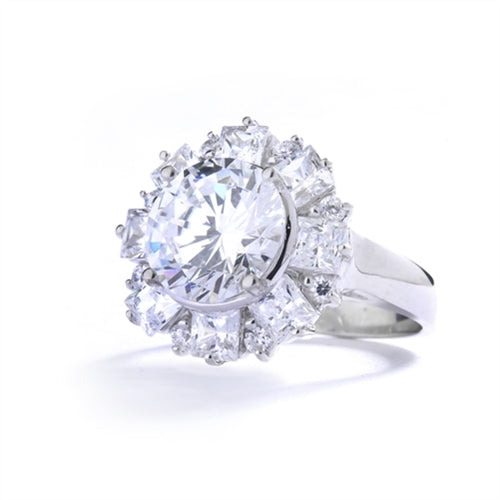 Diamond Essence Designer Ring With Round Brilliant Diamond Essence in center surrounded by alternately set Princess and melee. 7.25 Cts. T.W. set in 14K Solid White Gold.
