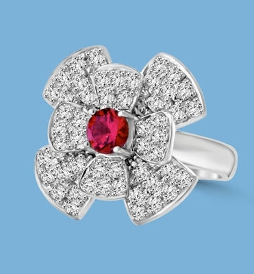 Stack of flowers - 0.65 Ct. Round Ruby Essence set in center of floral design Melee setting. 3.0Cts. T.W. set in 14K Solid White Gold.