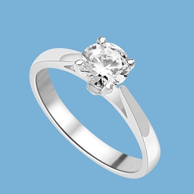 Tiffany Set Solitaire on Wide Band. 0.75 Cts. In 14k Solid White Gold.