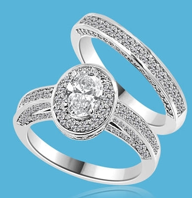 Wedding Set--1.0 ct. Oval cut Diamond Essence set in the center with melee around. Matching band with Melee. 2.50 cts.t.w. in14K Solid White Gold.