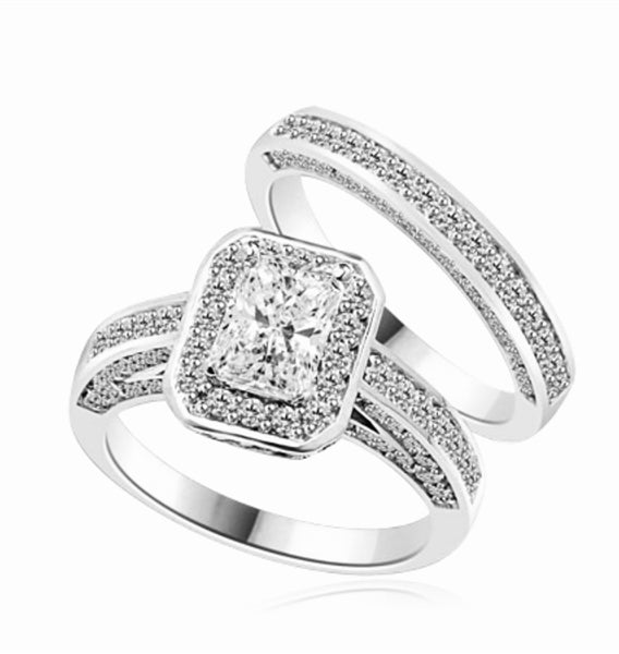Wedding Set - 1.0 Ct. Radiant Emerald cut Diamond Essence center with Melee around and flowing down the band. Matching band with Melee, 2.75 Cts. T.W. set in 14K Solid White Gold.