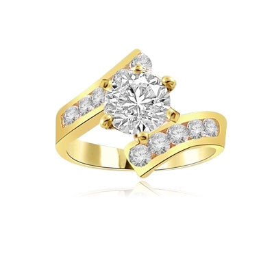 Ring  round stone & channel set round diamond pieces