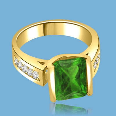 Sarabande - Impressive Ring with 4 Ct. Emerald Cut Emerald Essence Center and featuring Channel Set accents on the band. 5 Cts. T.W. in 14K Solid Yellow Gold.