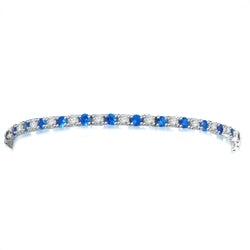 Diamond Essence Sapphire-and-Diamond Tennis Bracelet--7" tennis bracelet alternates round-cut Sapphire Essence and Diamond Essence jewels.5.0 Cts. T.W. set in Platinum Plated Sterling Silver.