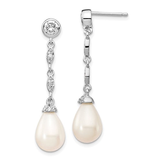 Diamond Essence Designer Earring with round brilliant melee and 8mm Pearl. Perfect for all occasions, 1.40 cts. t.w. in Platinum Plated Sterling Silver.