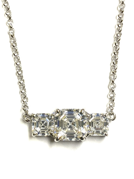 Beautiful Trio Necklace with Diamond Essence Asscher cut Stones set in four prongs,Platinum Plated Sterling Silver, 3.5 cts.t.w. 2 carat in the center and 0.75 ct. on each side.