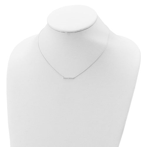 Beautiful and delicate bar necklace with simulated round brilliant diamond essence stones set in platinum plated sterling silver, 0.5 cts.t.w. Dazzle with this delicate sparkle in your neck all day long.