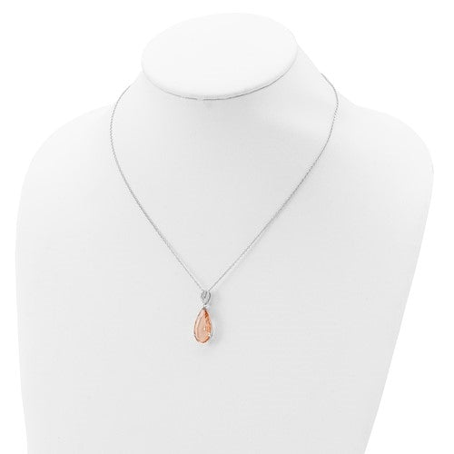 Diamond Essence Designer Morganite Pear Essence pendant  and Melee On the Bail, 7.20 Cts.T.W. In Platinum Plated Sterling Silver.
Approx Size 28mm Length And 10mm Width.