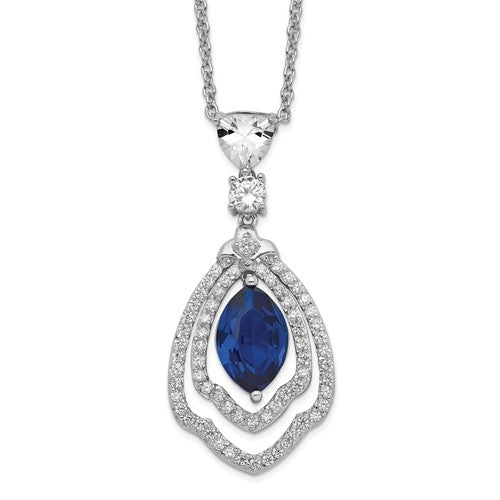 A marvelous prong set designer pendant for women with simulated 2.0 Cts. marquise cut sapphire center surrounded by a brilliant melee diamonds by Diamond Essence set in platinum plated sterling silver. 2.50 Cts.t.w.
