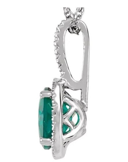 Designer Pendant With Emerald Essence Round cut stone in four prongs setting and surrounded by Diamond Essence Melee,1.50 Cts.T.W. in Platinum Plated Sterling Silver.